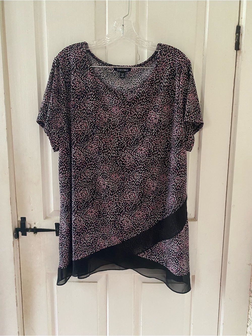 Roz & Ali Black Top with Pink Burst Print and Sheer Asymmetric Hem